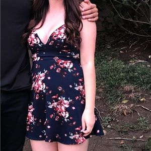 Windsor Navy Blue Floral mini dress! Ties into a bow in the back!